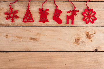 Red Christmas decoration on wooden table