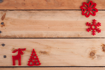 Red Christmas decoration on wooden table