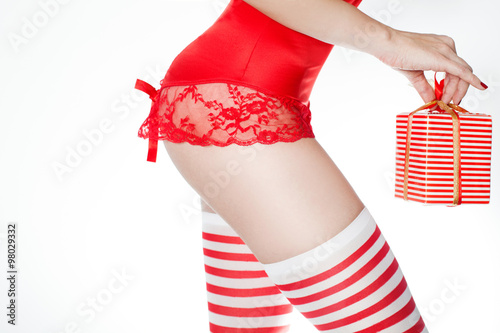 sexy butt of woman wearing christmas holiday lingerie and sexy santa stockings with gift - Santa Stockings sexy butt of woman wearing christmas holiday lingerie and sexy santa stockings with gift - Santa Stockings