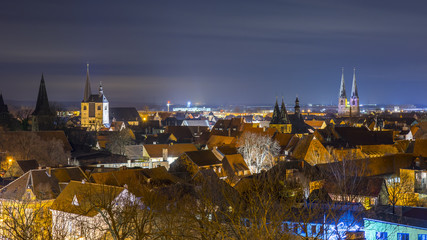 Evening silhouette of medieval town Quedlinburg, in Saxony-Anhalt in Germany.