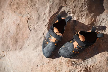 Gardinen Rock climbing shoes closeup © serhiipanin