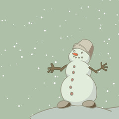 Happy snowman stands in the snow
