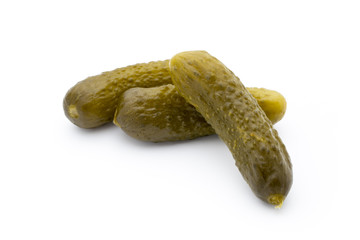 Pickled cucumbers isolated on white background.