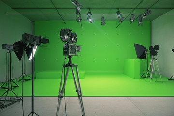 Modern empty green photo studio with  old style movie camera
