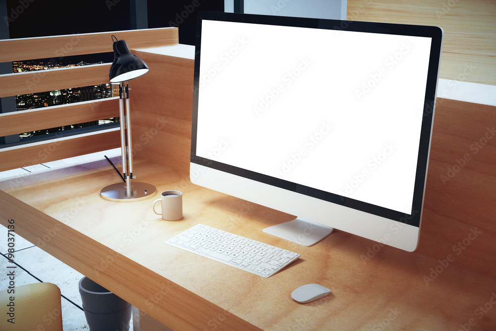 Aufkleber blank white computer screen with lamp on wooden table at hight,