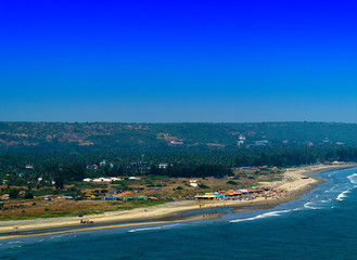 Fototapeta na wymiar Horizontal vivid indian sand beach landscape background backdrop