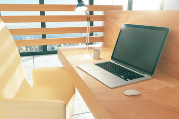 Wood style work space with laptop and coffee mug