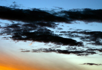 Fototapeta premium Horizontal vibrant dramatic sunset cloudscape background backdro