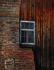 brick and wooden wall with window