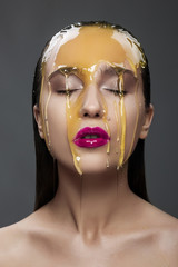 woman with a honey on her face and pink lips - 98039526