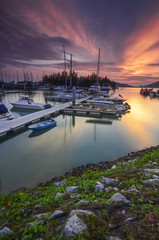 Fototapeta na wymiar Beautiful composition view of Malaysian Harbour with a yatch dur