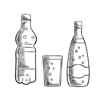 Bottles and glass of sweet soda drink