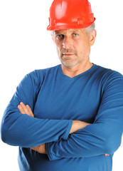 Working man in a protective helmet. Portrait.