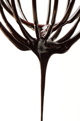 Wire whisk with chocolate sauce,cooking bakery