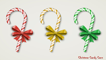 Christmas Candy Cane with Red Bow Isolated on White Background.