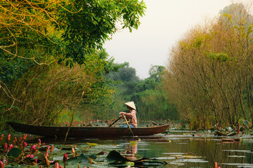 tourist boat on Yen stream in Huong pagoda, Hanoi, Vietnam. 