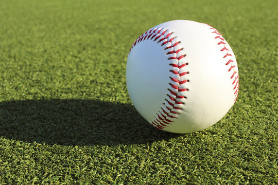 Baseball ball and the ground