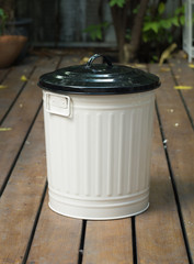 Bin on wooden floor