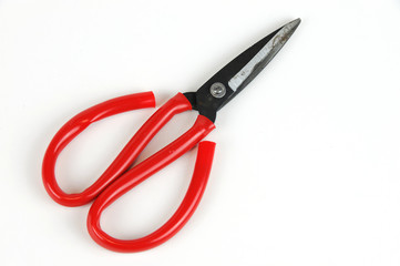 old fashioned scissors on white background