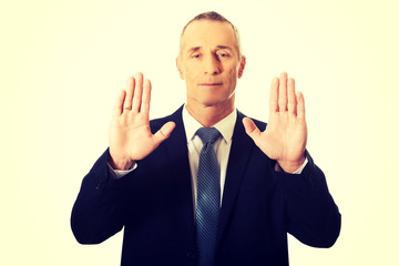 Businessman pressing abstract screen