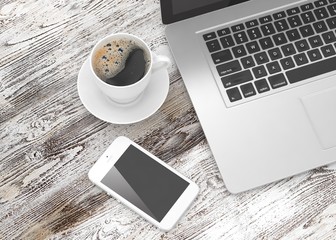 Laptop smartphone and coffee cup