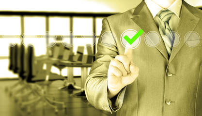 business man touching, pressing modern button with green ticking Check Box