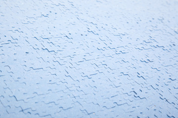 Connected blue puzzle pieces isolated