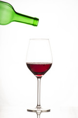 Glass of wine and bottle