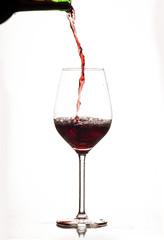 Glass of wine and bottle