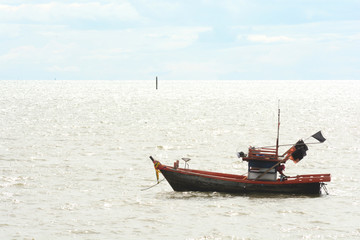 Naklejka na ściany i meble Boat sail on the sea