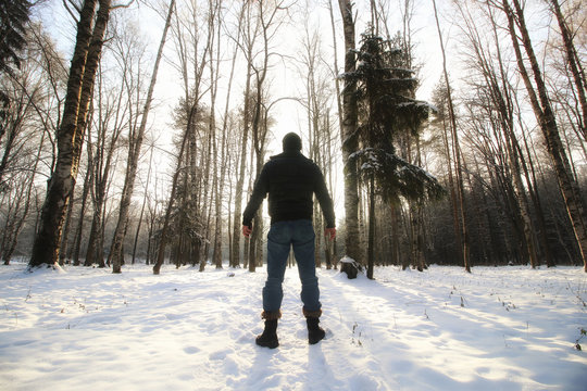 Winter forest man - Powered by Adobe