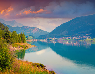 Colorful summer morning on the Resia lake