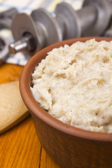 Lard the twisted in a meat grinder