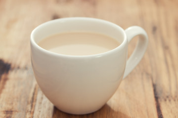 Obraz na płótnie Canvas cup of coffee with milk