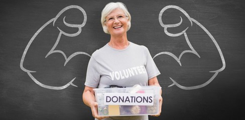 Composite image of happy grandmother holding donation box - Powered by Adobe