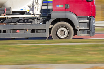 Moving truck on the road, panning shot
