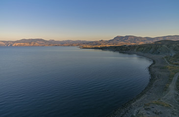 Fototapeta na wymiar Early morning in a quiet bay. Crimea.