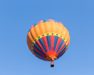 Fototapeta premium Colorful hot air balloon with blue sky background