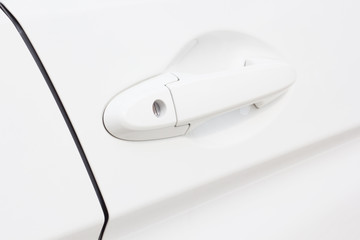 Car door handle of white modern car