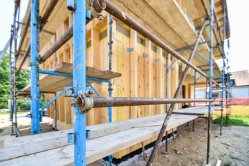 Fototapeta na wymiar scaffold on a residential hard wood passive house