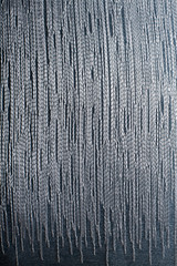 Fototapeta premium Texture turquoise fabric with white stitch. Background