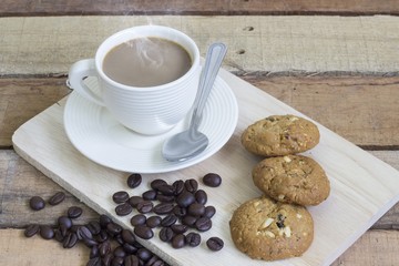 Hot coffee with a snack or cake during break time a little happiness at work.