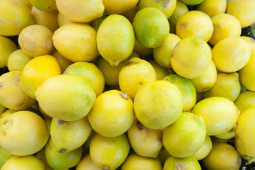 Yellow background of lemon heap