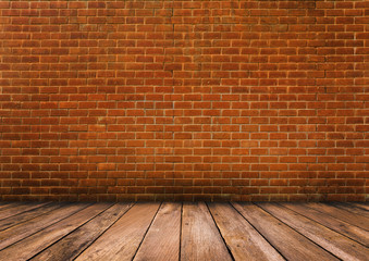 Wood floor with red brick wall
