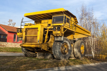 Fototapeta na wymiar Bor, Serbia - December 08.2015: Yellow dumper truck 04