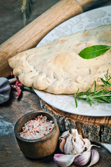 Calzone, closed pizza, Italian pastry stuffed with cheese, meat