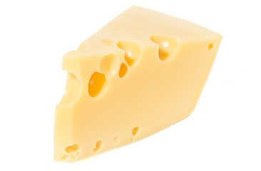 Close up of a delicious wedge of fresh cheese isolated on white.