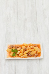 Delicious dish of cooked potatoes with meat