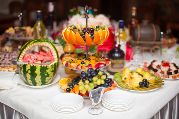 beautifully cut fresh fruit on the holiday table