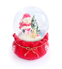 A snow globe with snowman on white background